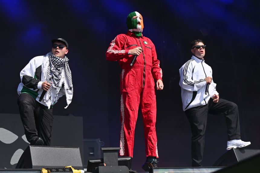 Irish-speaking rap group Kneecap performs at the Glastonbury Festival in the UK in June 2025. The trio was banned from Canada on Friday ahead of their October tour dates there.